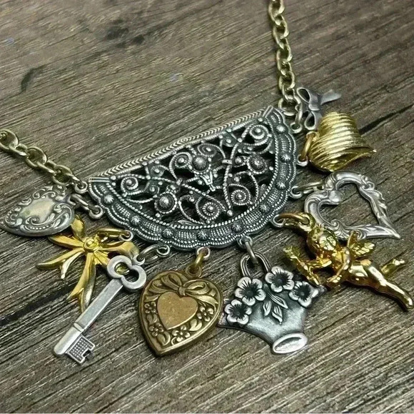 Vintage Bows, Hearts, Flowers, and Cupid Charms Multi Tone Metal Necklace - Picture 3 of 3
